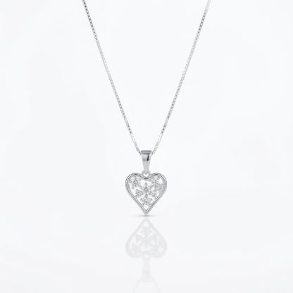 Collar Corazón Floral Plata 925: corazón calado con flores de circones, otro ángulo